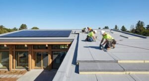 Modern flat roof renovation on a contemporary house with professional workers and high-quality materials.