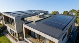 Modern flat roof renovation featuring high-quality materials and energy-efficient elements like solar panels under a clear sky.