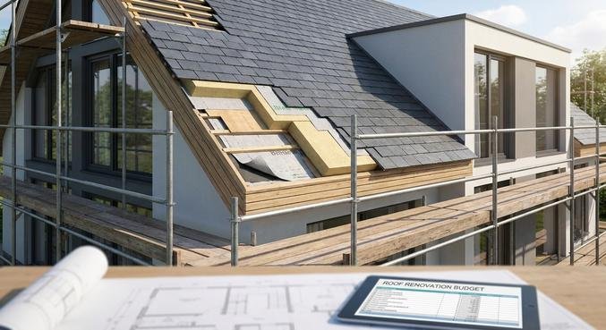 Modern house undergoing roof renovation with scaffolding, showing new insulation and roof tiles for 2024 energy efficiency.