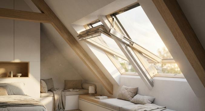 A modern roof window with an installed electric drive motor opening for ventilation in a bright attic room.